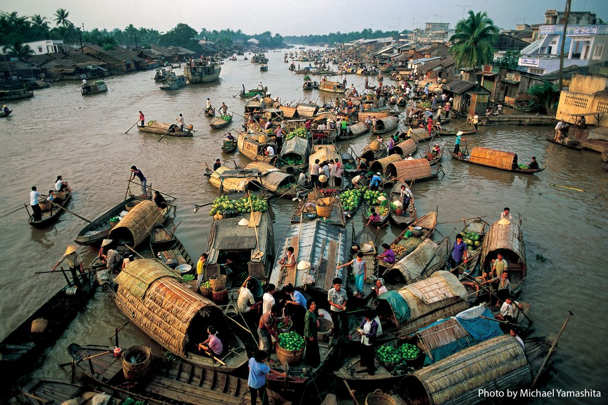 Traders meet at the confluence of five canals at Phung Hiep.